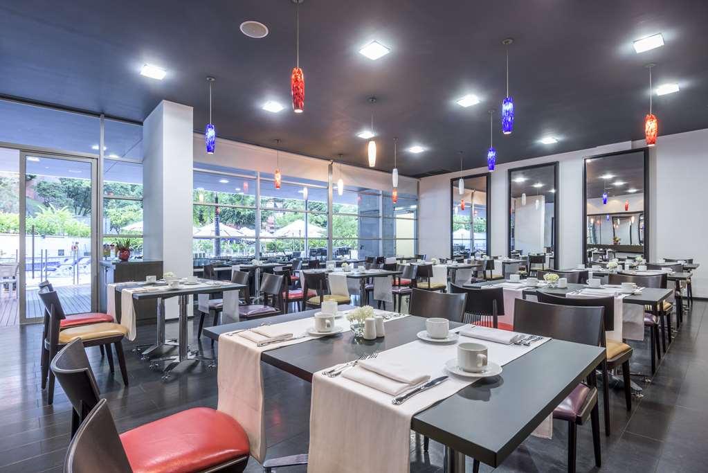 麦德林皇家nk酒店 餐厅 照片